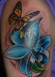 Butterfly and blue lily tattoo