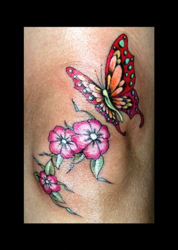 Butterfly and flower on knee
