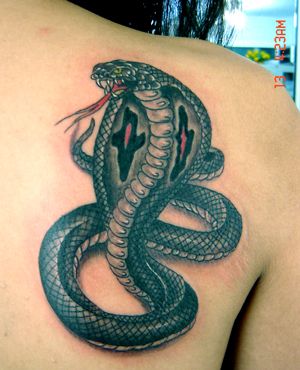 Dark cobra tattoo