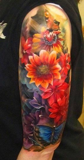 Flowers and butterlies tattoo