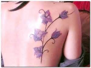 Purple flowers tattoo