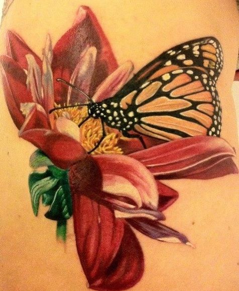 Red flower and butterfly tattoo