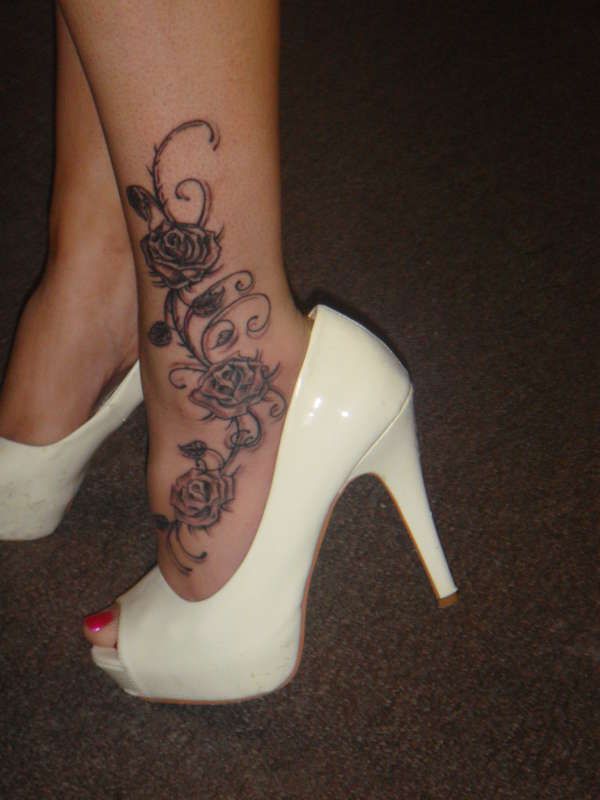 Rose tattoo on ankle