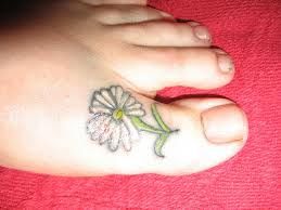 White daisy on toe