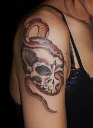 Tattoo with skull and snake
