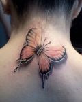 Orange and black butterfly tattoo