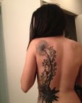 Dandelion back tattoo