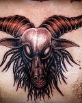 Aries tattoo on chest
