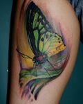 Big butterfly tattoo on calf