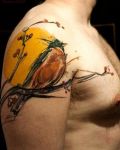 Bird on branch tattoo