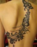 Black patterns back tattoo