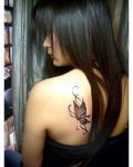 Girl with black tatttoo butterfly