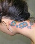 Flowers tattoo on neck