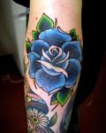 Blue flower on elbow
