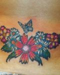 Nice tattoo with flowers