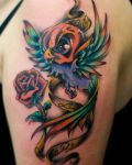 Colourful tattoo with bird