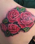 Four red roses as tattoo