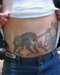 Funny tattoo on belly