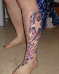 Colourful stars tattoo on leg