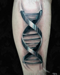 Metal coil tattoo on calf