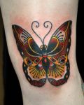 Butterfly tattoo on knee