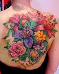 Colourfull flowers tattoo back