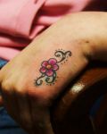 Pink flower on the hand