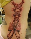 Red ribbons tattoo