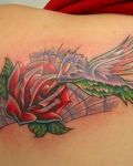 Rose and bird tattoo