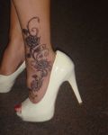 Rose tattoo on ankle