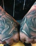 Rose tattoos on the hands