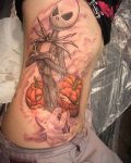 Skeleton and pumpkins tattoo