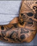 Sleeve tattoo with skulls