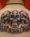 Three skulls tattoo