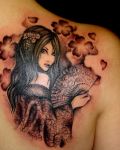 Woman among flowers tattoo